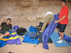 Gabe, David, and Teppy prepare to sleep outside