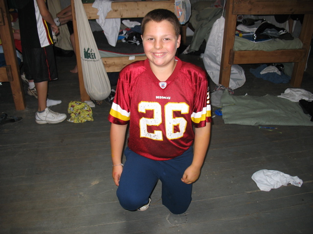 Sam dresses for football (fashion show)