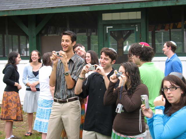 Shoshana, Lauren, Suzanne, Daniel, Amir (covering Nomi), Yael, Danny, Phil (covering Susy), Shira, Jonathan, Rachel, all taking pictures of Rachel and Yoav