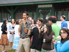 Shoshana, Lauren, Suzanne, Daniel, Amir (covering Nomi), Yael, Danny, Phil (covering Susy), Shira, Jonathan, Rachel, all taking pictures of Rachel and Yoav