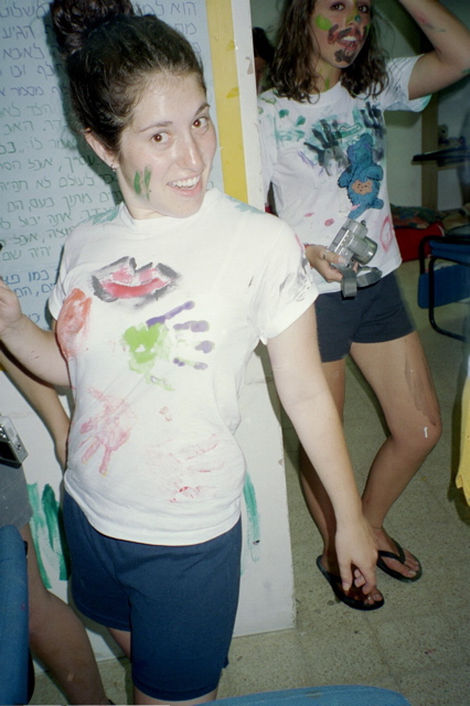 Francie displays her painting shirt