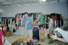 Organizing Clothes in a Secondhand store in Yerucham