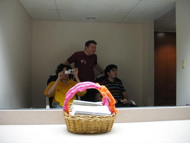 Nathan, Gabe, and Phil in the rocking chairs in the anteroom of the girls' restroom