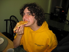 Nathan eating pizza the right way